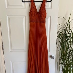 Rust colored plunge-neck dress